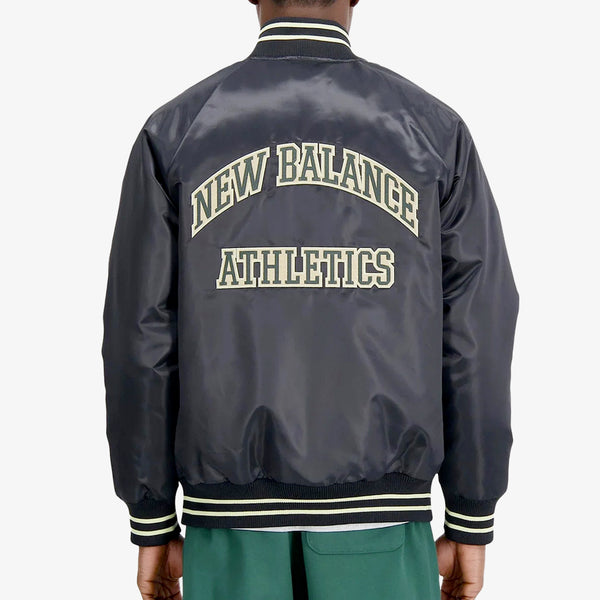 NEW BALANCE ATHLETICS VARSITY SATIN BOMBER JACKET BLACK