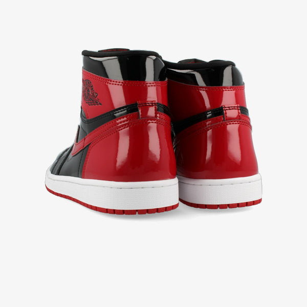 NIKE AIR JORDAN 1 RETRO HIGH OG BLACK/WHITE/VARSITY RED [BRED PATENT]